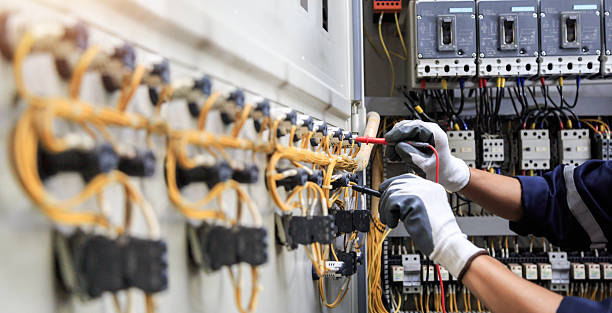 Professional Electrician technician working in Marengo, IA